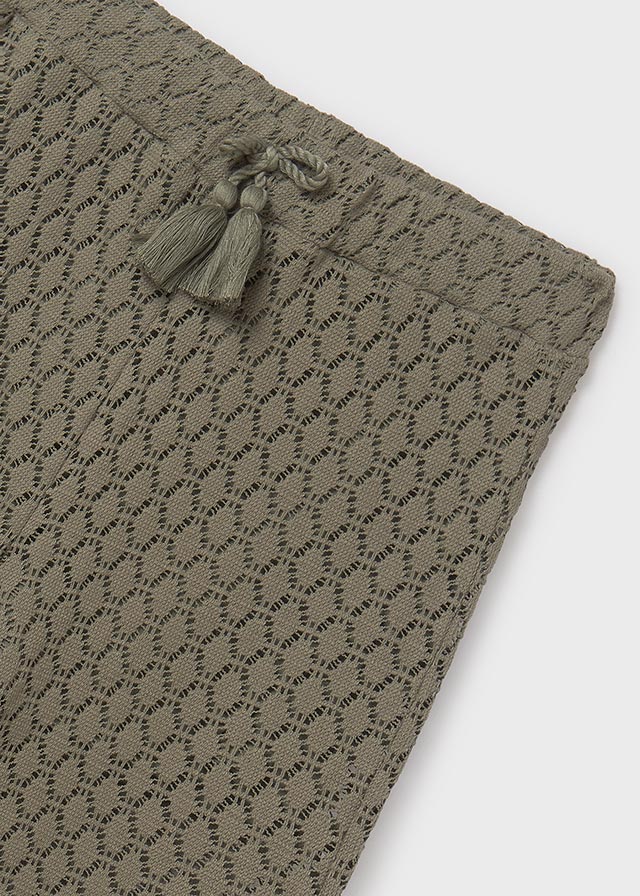 Girl's perforated trousers