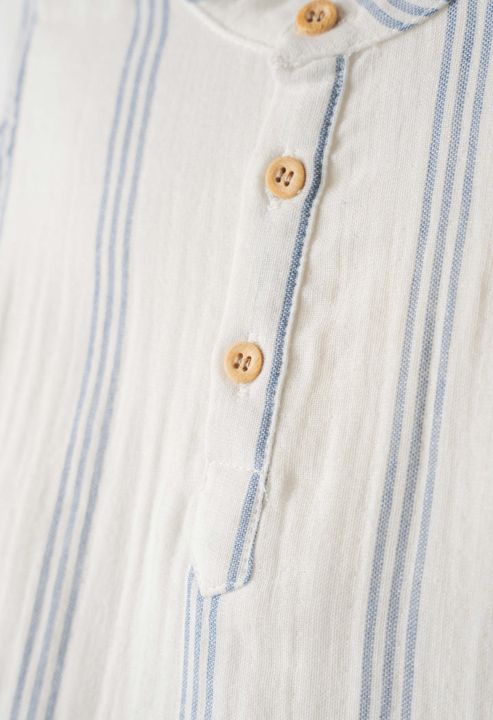 Completo maglia, pantaloncino e cappellino con visiera baby maschio