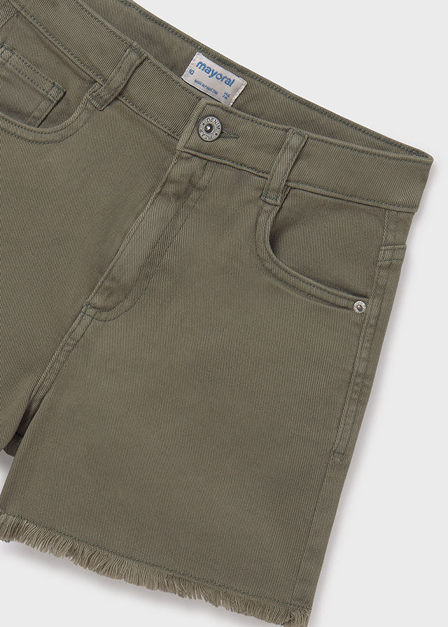 Green shorts girl