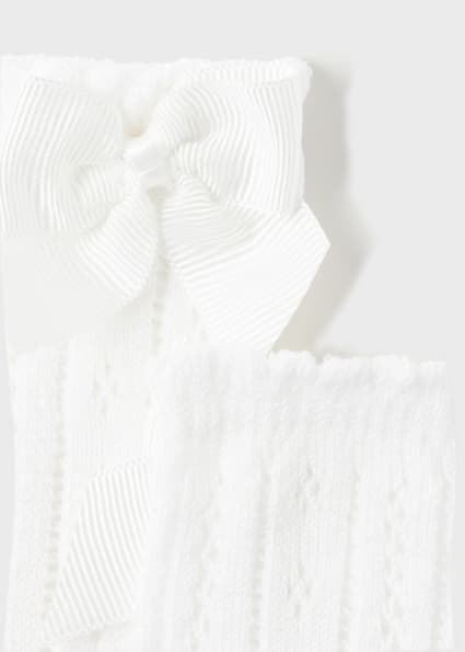 Calzini traforati con fiocco baby femmina